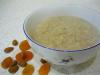 Cook oatmeal porridge with milk and water