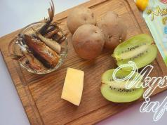 Layered salad with sprats and cheese